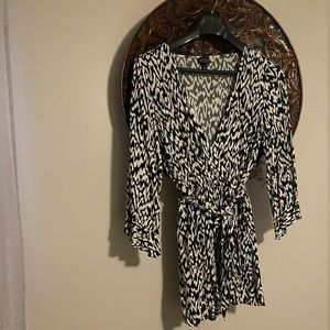 Scoop ruffle tie romper.  NWT